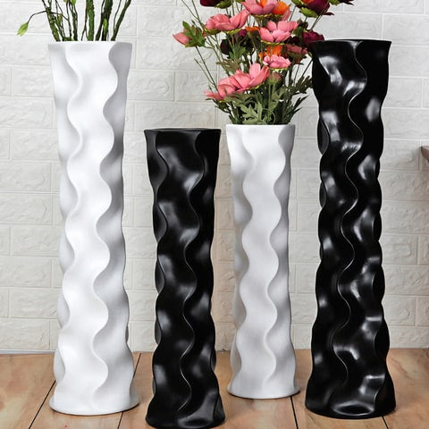 Grand Vase Décoratif Vagues Ondulées en céramique, présentation de tous les modèles posés au sol avec fleurs.