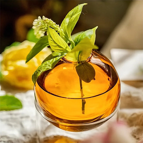 Soliflore Sphérique sur Socle Tubulaire, présentation du modèle orange avec fleurs, vu de près.