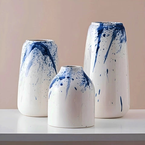 Vase Artistique Blanc et Encre Bleue en Céramique présentation de tous les modèles sans fleurs.