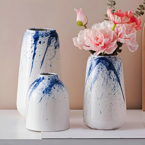 Vase Artistique Blanc et Encre Bleue en Céramique présentation des modèles L, S et M avec fleurs.