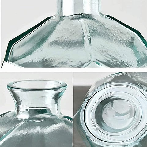 Vase géométrique polygonale transparent en verre détails du dessous, du col et du verre.