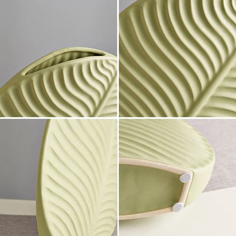 Vase rond motif feuille en céramique détails du dol, du motif et du dessus avec tampons de protections.