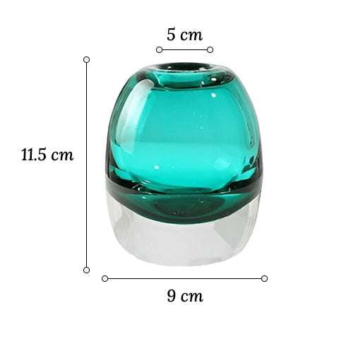 Vase soliflore ovale bleu translucide en verre dimensions taille S sur fond blanc.
