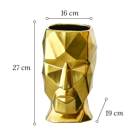 Vase visage design doré en céramique dimensions sur fond blanc.