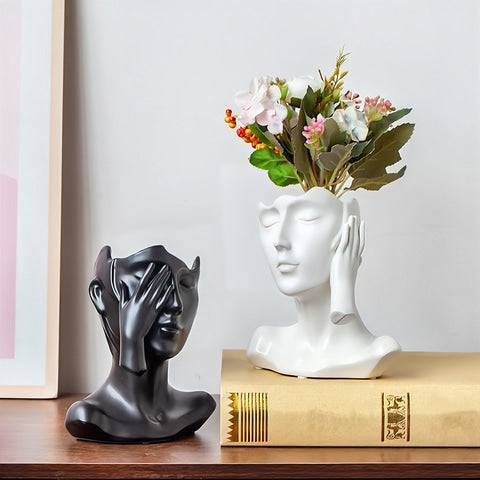 Vase visage femme esthétique en céramique des modèles B noir et A blanc avec fleurs.