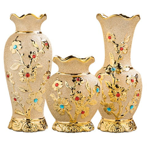Vase chic relief floral couleur or luxueux présentation modèles A 19cm B 32cm et C 34cm