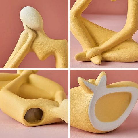 Soliflore design figurine pensive détails du vase