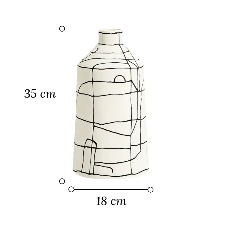 Vase Artistique Blanc aux Lignes Abstraites Noires, dimensions du modèle A 35 cm sur fond blanc.