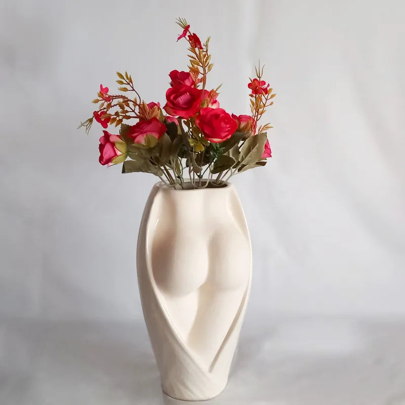 Vase Fessier Femme Vice-Versa présentation du modèle grand avec bouquet de fleurs rouges.