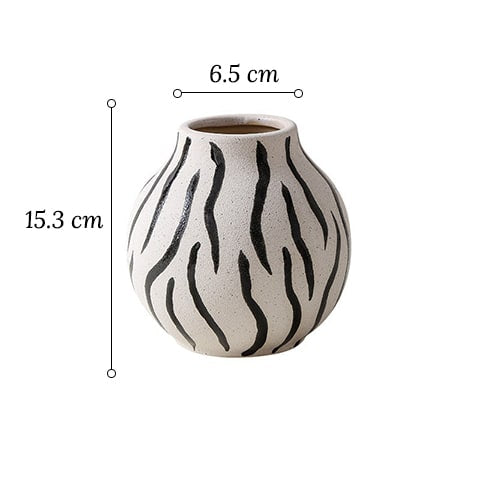 Vase rond blanc motifs décoratifs en céramique dimensions modèle Zèbre sur fond blanc.