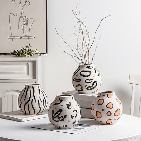 Vase rond blanc motifs décoratifs en céramique présentation tous les modèles