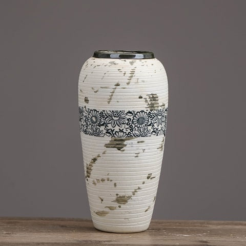 Vase tacheté décoration florale noire en céramique présentation du modèle L