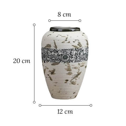 Vase tacheté décoration florale noire en céramique dimensions du modèle M sur fond blanc.