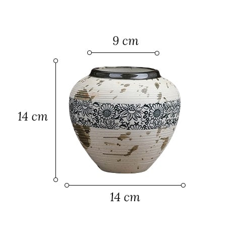 Vase tacheté décoration florale noire en céramique dimensions du modèle S sur fond blanc.