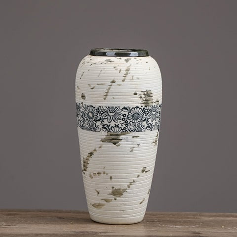 Vase tacheté décoration florale noire en céramique présentation du modèle L.