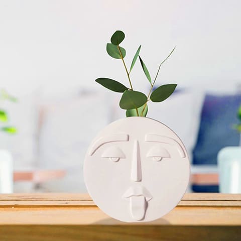 Vase visage blanc atypique en Céramique modèle Rond S présentation avec tiges florale