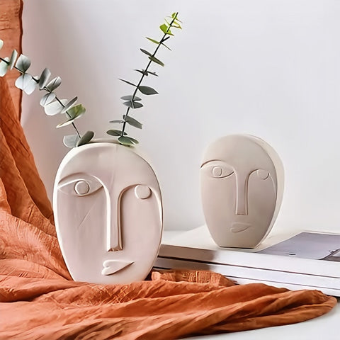 Vase visage blanc en céramique modèles Ovale L avec tiges florale & Ovale S présentation